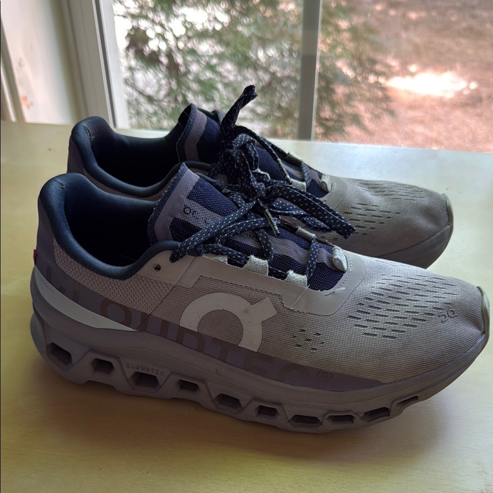 On Running Gray and Purple Athletic Shoes with Cloud Cushioning